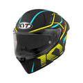 Full-face helmet, matte black with yellow and blue neon graphics, clear visor
