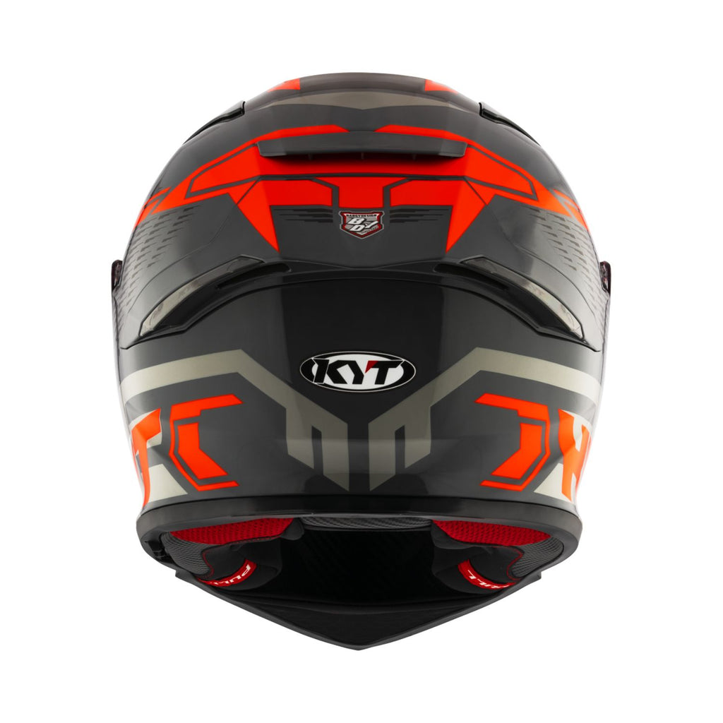 Gloss black and red helmet rear with KYT badge and gray trim, ventilation cutouts