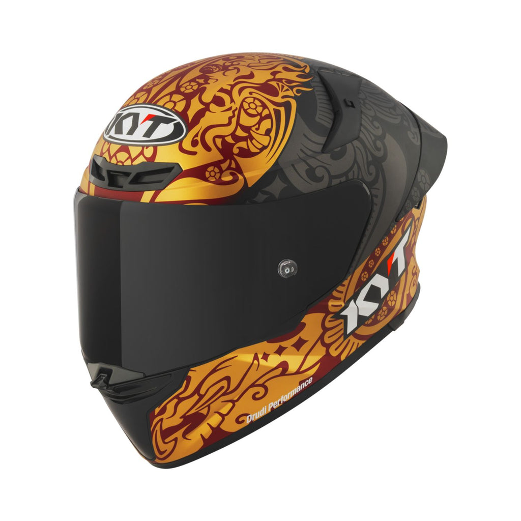 Matt black motorcycle helmet with orange-gold dragon design and chin strap