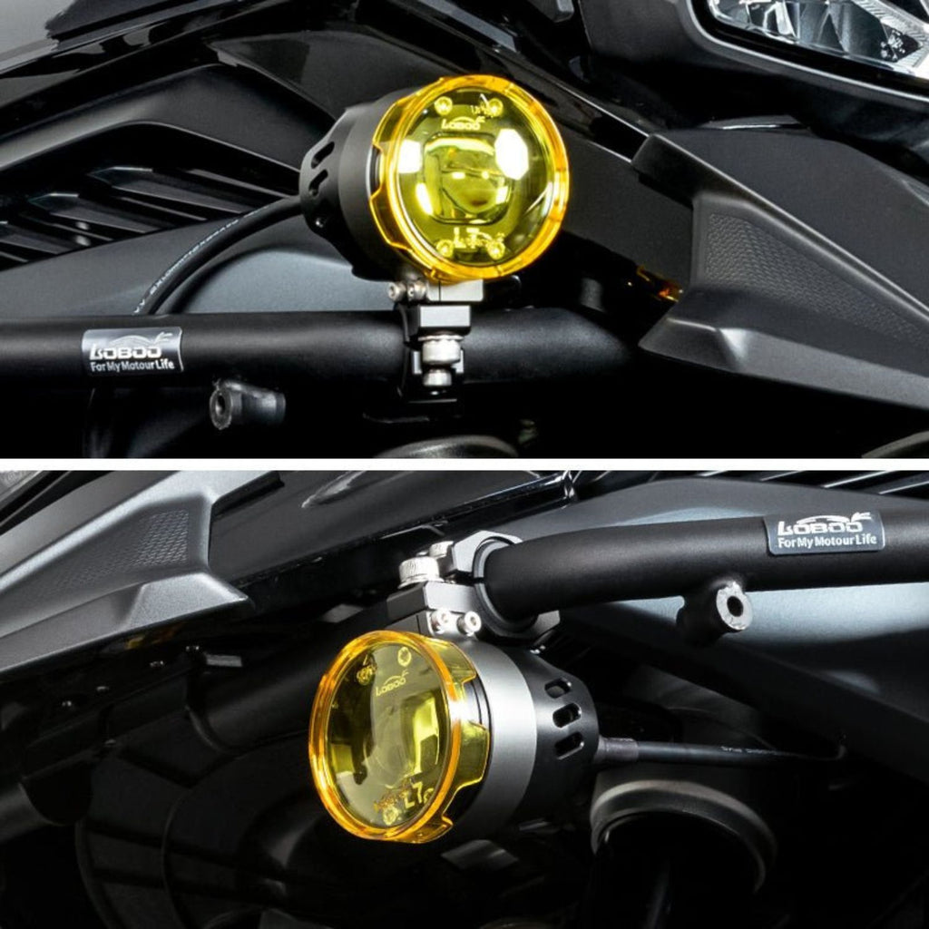 Loboo L75 auxiliary light with yellow lens and metal mount on motorcycle fairing