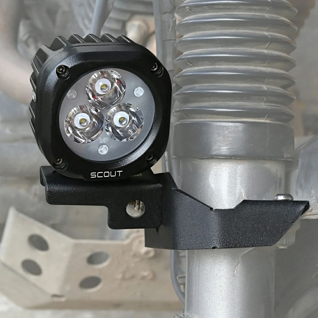 Scout 20W fog light mounted on vehicle bracket, front lens with triple LED reflectors