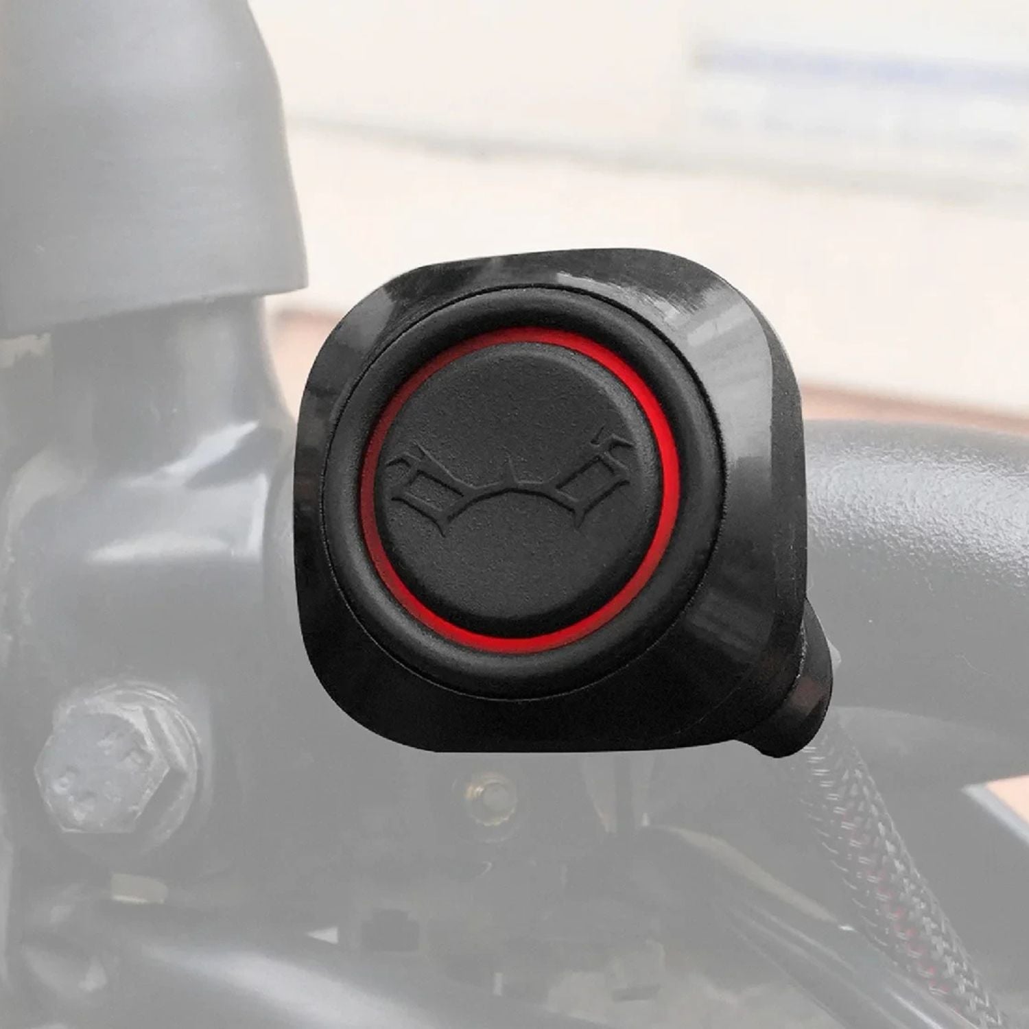Red-ring switch button with embossed icon on rubber housing