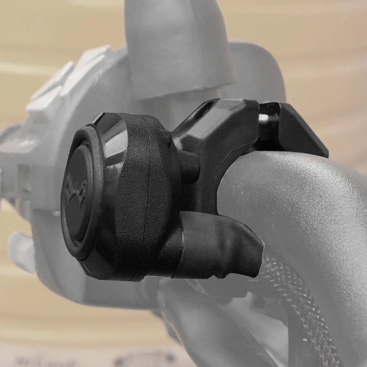 Rubber switch housing on handlebar grip with red-ring button