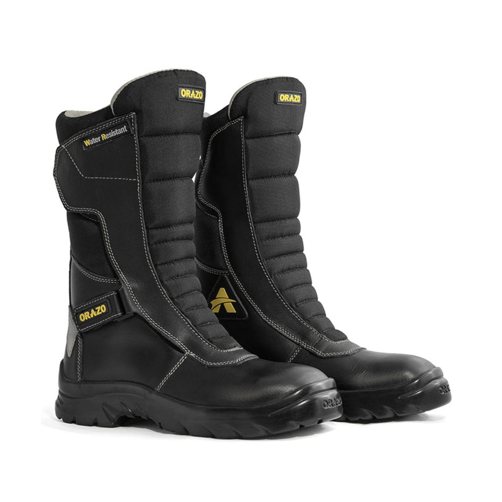 Riding boots in black with padded shafts, quilted panels, and water-resistant branding patch