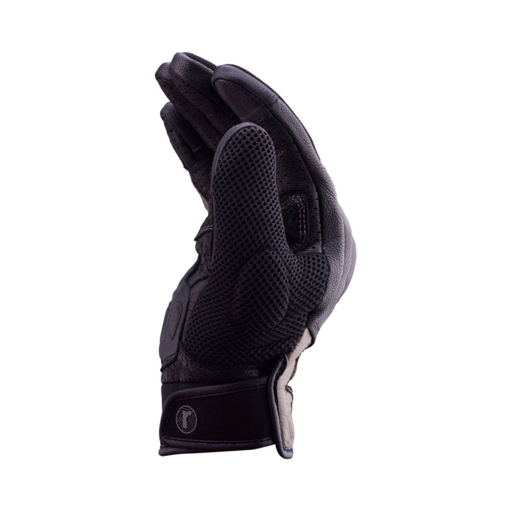 Reise Austra glove side view, dark textured fabric with elastic cuff and tan trim
