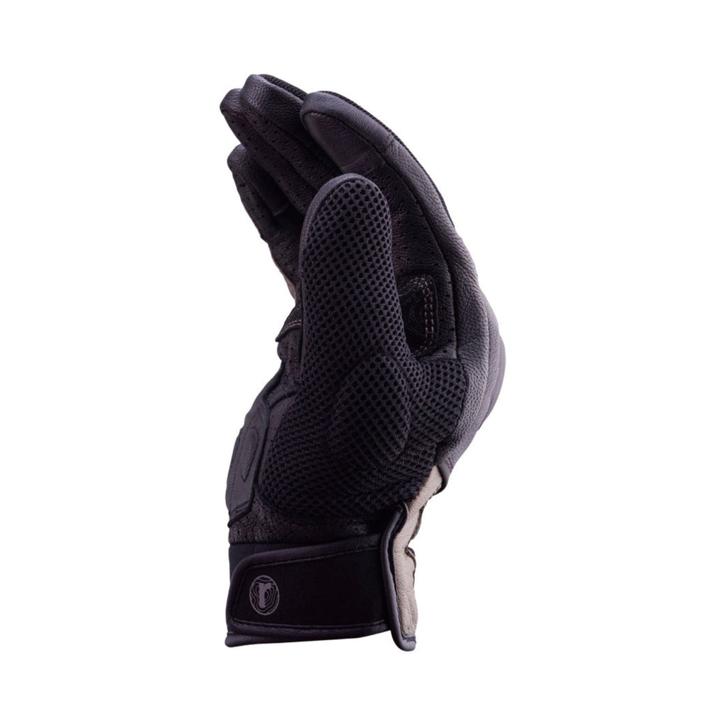 Reise Austra sand glove side view, dark textured fabric with elastic cuff and tan trim