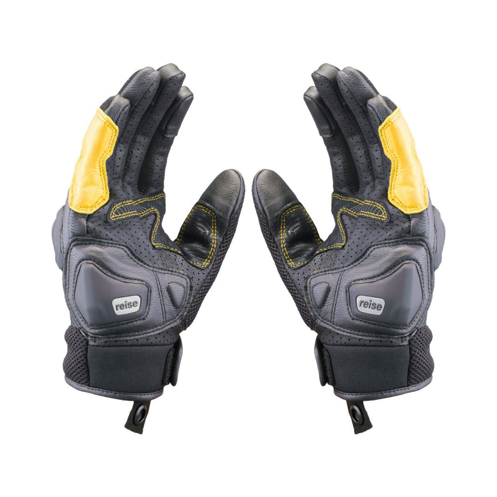 Pair of dark gray gloves with yellow wrist panels and padded knuckle protection