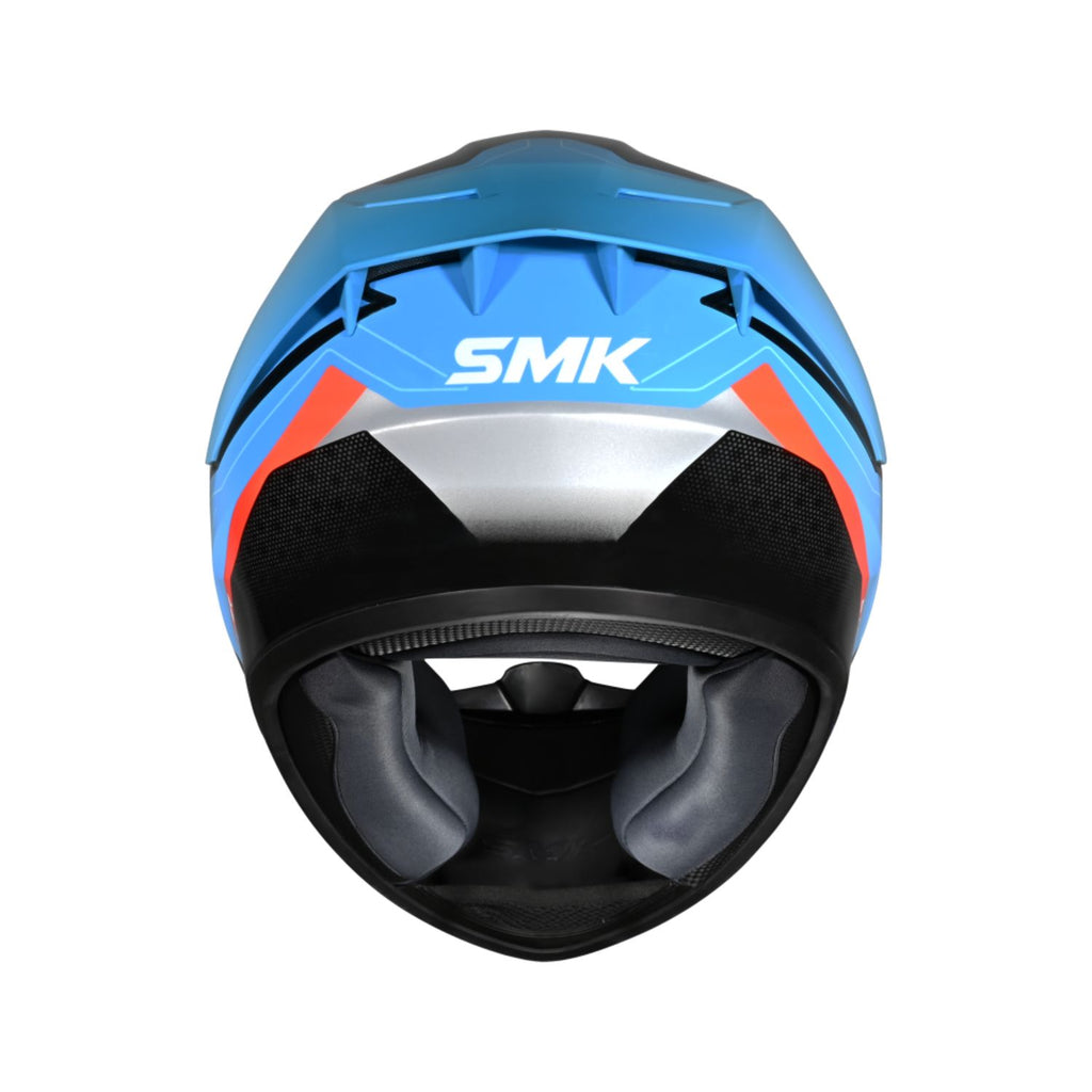 Helmet rear/top: blue crown with SMK logo, black ear area and ventilation