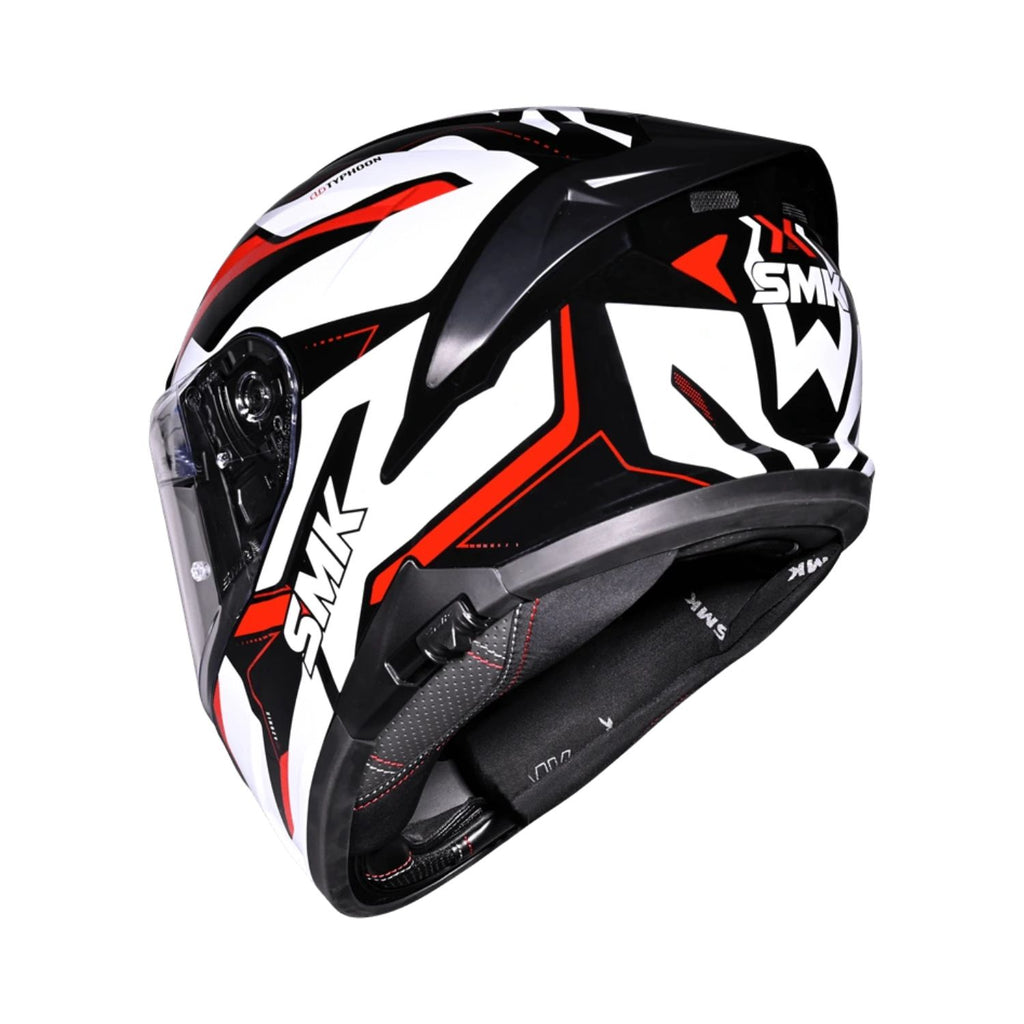 Seitenansicht Motorradhelm mit weiß-schwarzem Grafikdesign und rotem Akzent, Klappvisier
