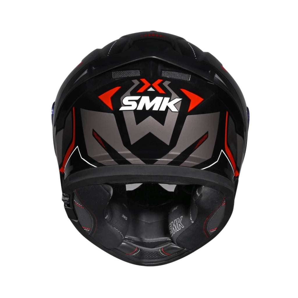 Helmet interior view showing padding and chin area, black with red stitching accents